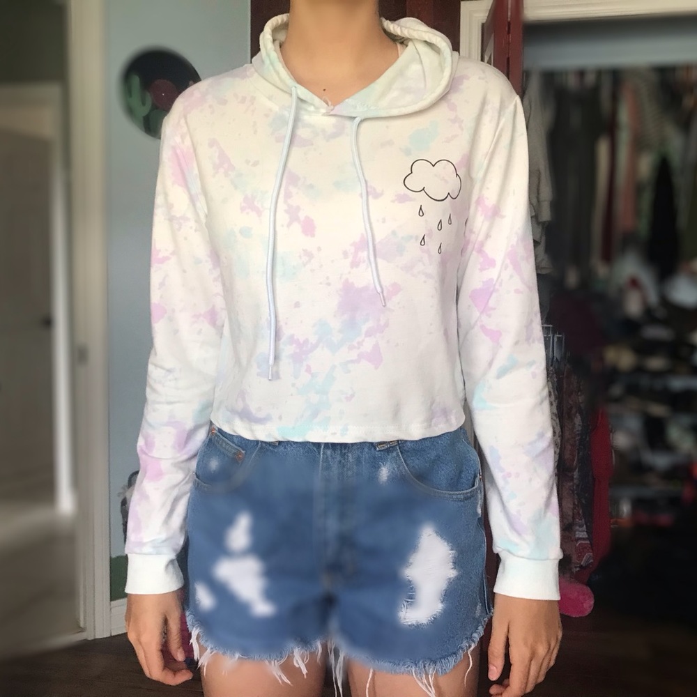 Cropped long sleeved hoody styled shirt.